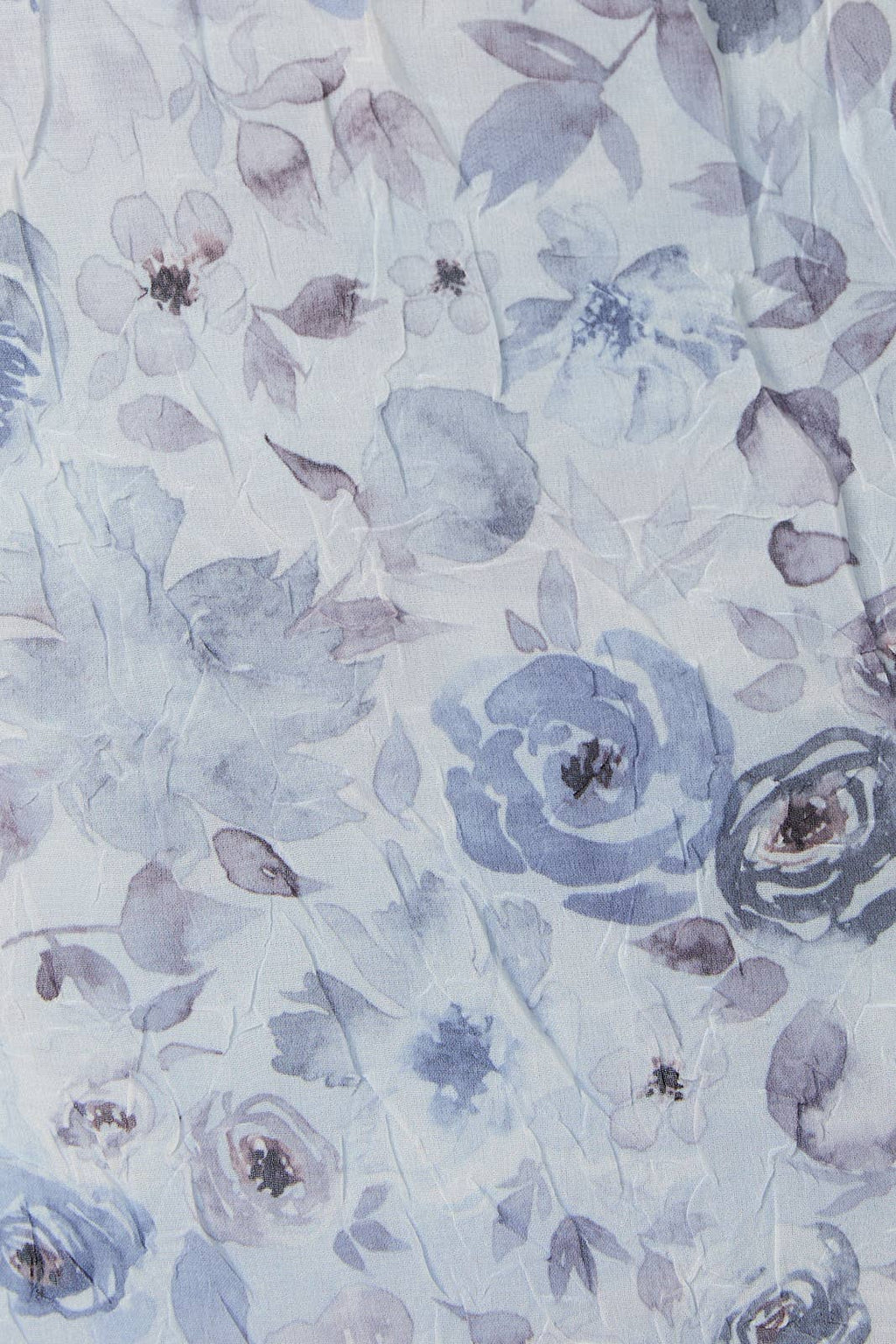 Floral pattern with blue and gray flowers on a light background