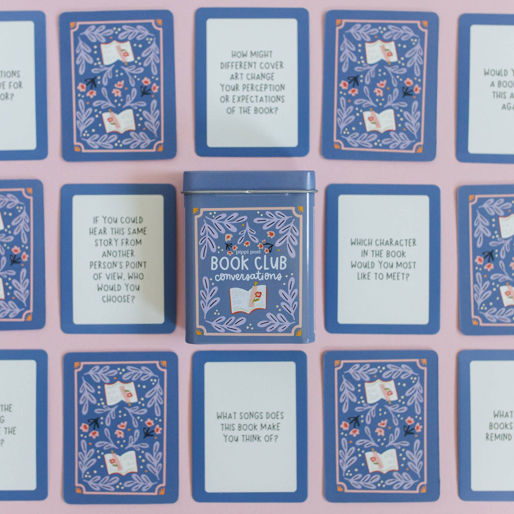 Set of book club discussion cards with a central tin labeled 'Book Club Conversations' on a pink background.