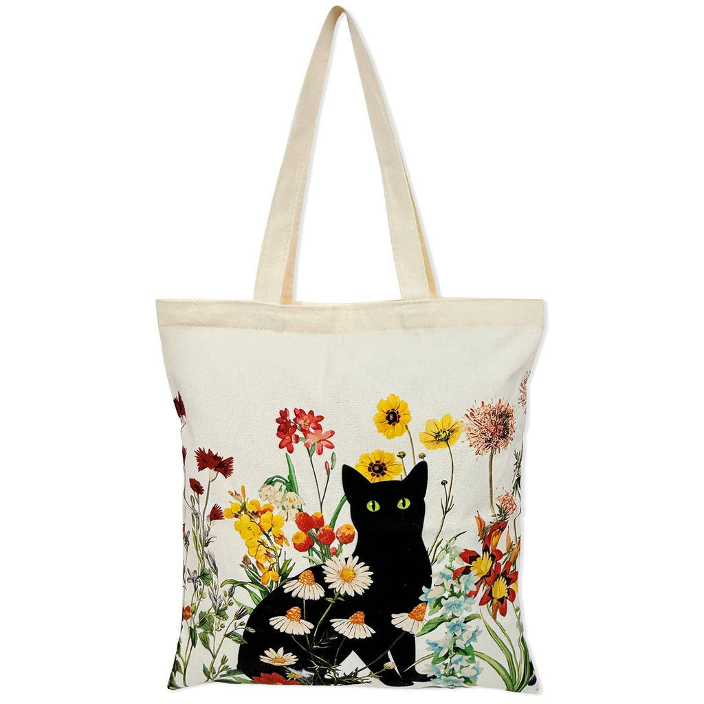 Tote bag with a black cat and floral design on a white background