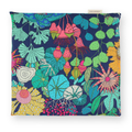 Small hot or cold aromatherapy wrap featuring a vibrant, hand-drawn botanical pattern on a navy blue background. The pattern includes pink hanging seed pods, green leaves, yellow flowers, and teal botanical elements.