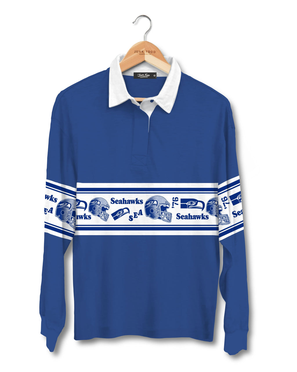 A royal blue long-sleeve polo shirt with a white collar and a horizontal white stripe across the chest and sleeves featuring Seahawks graphics, hanging on a wooden hanger against a white background.