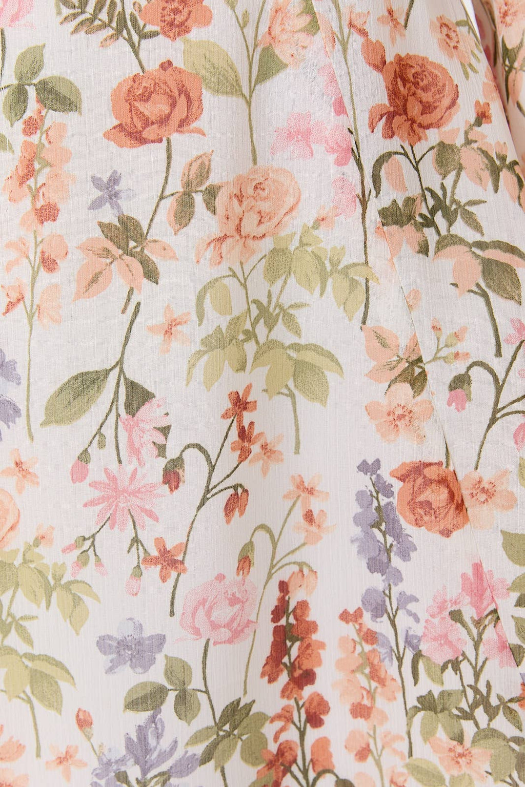 Floral pattern with pink, orange, and purple flowers on a light background