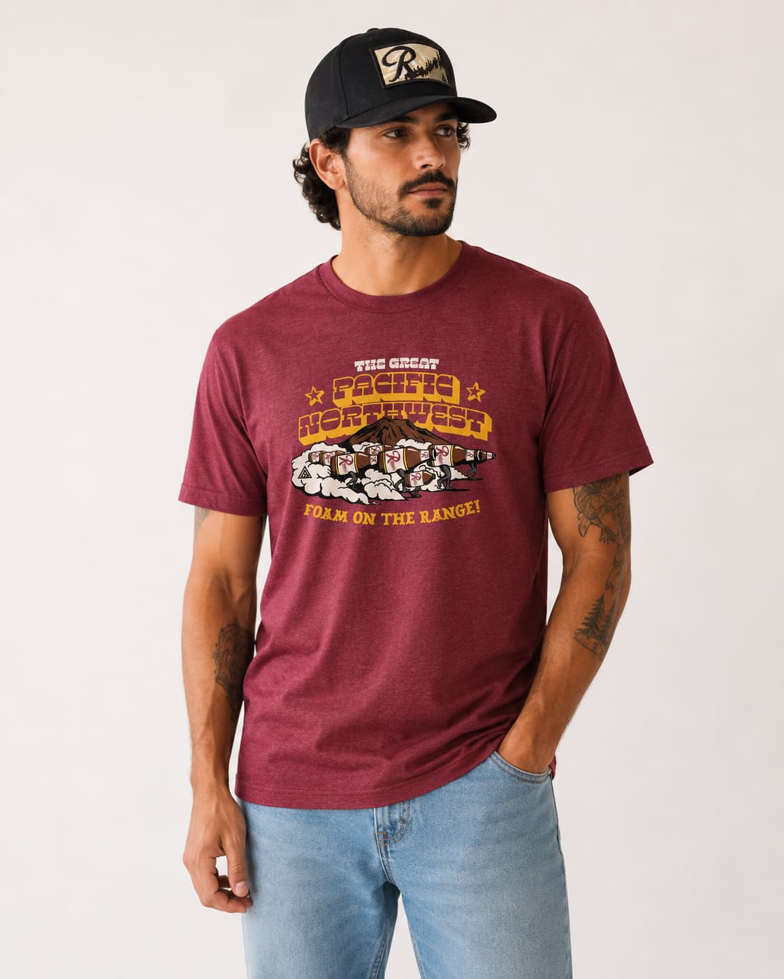 man in rainier beer graphic tee