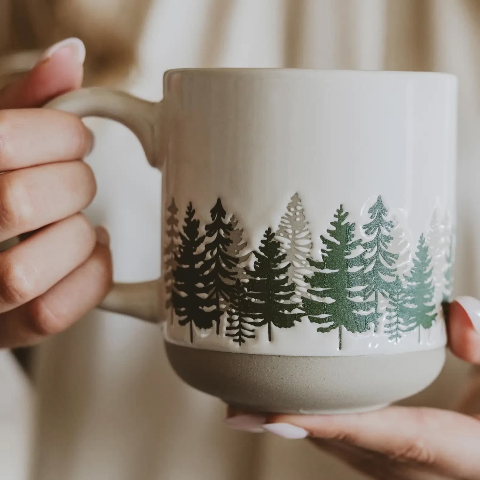 stoneware mug with forest design