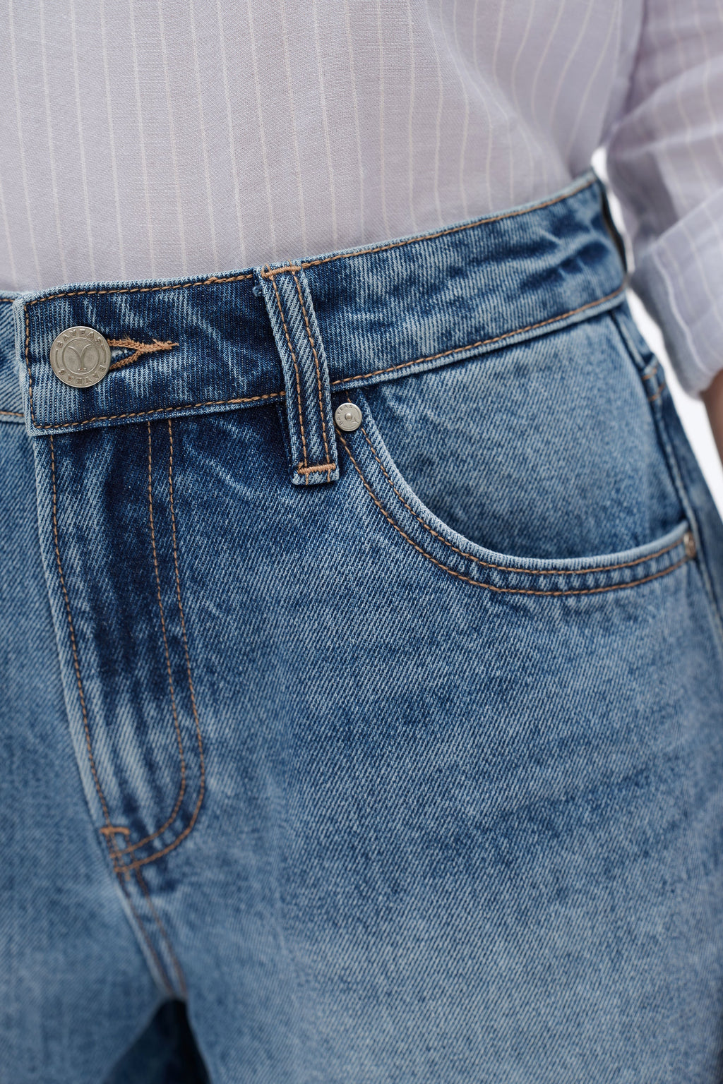 Close-up of blue jeans with a blurred background