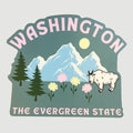 A die-cut sticker featuring a Washington state landscape with pink lettering reading 'WASHINGTON' and 'THE EVERGREEN STATE,' blue mountains, green trees, flowers, and a white goat on a light gray background.